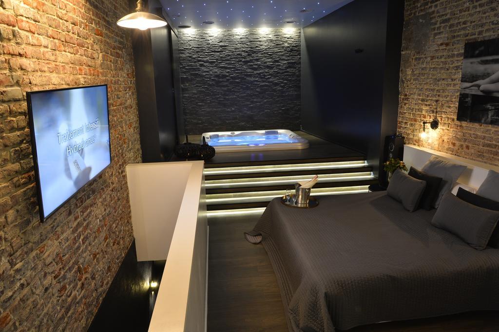 chambre avec jacuzzi sauna privatif Bruxelles Exterior foto